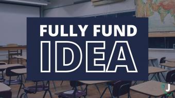 Graphic of an empty classroom with a blue fade behind a text box reading &quot;FULLY FUND IDEA&quot; 